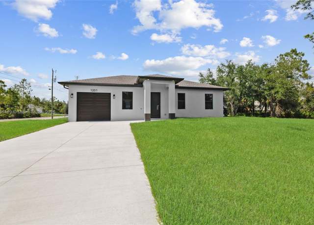 Property at 1201 7th, Lehigh Acres, FL, 3 beds, 3 baths