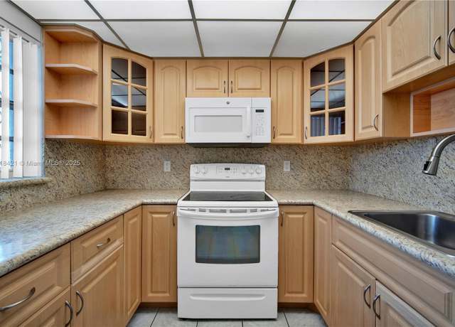 Property at 6825 W Flagler St #303, Miami, FL 33144, 2 beds, 1.5 baths