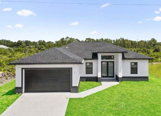 Property at 2611 34 St W, Lehigh Acres, FL 33971, 3 beds, 2 baths