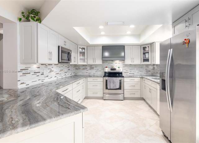 Property at 10263 Islander Dr, Boca Raton, FL 33498, 4 beds, 2.5 baths