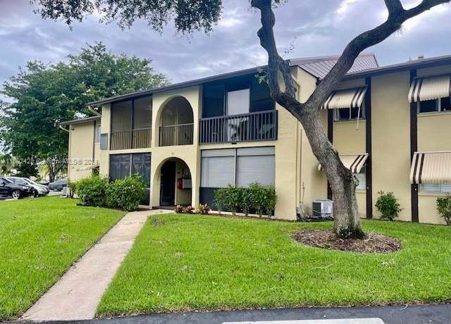 Property at 305 Pine Ridge Cir Unit A-2, Green Acres, FL 33463, 2 beds, 1 bath