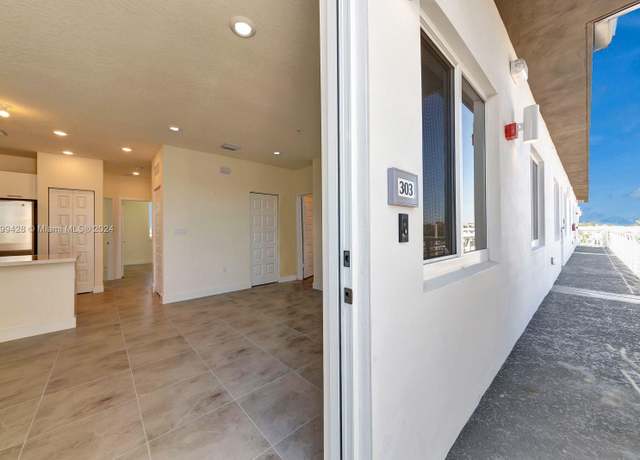 Property at 6420 NW 102nd Path #303, Doral, FL 33178, 3 beds, 2 baths