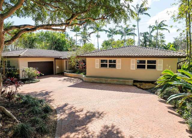 Property at 12 Minnetonka Rd, Sea Ranch Lakes, FL 33308, 4 beds, 2 baths