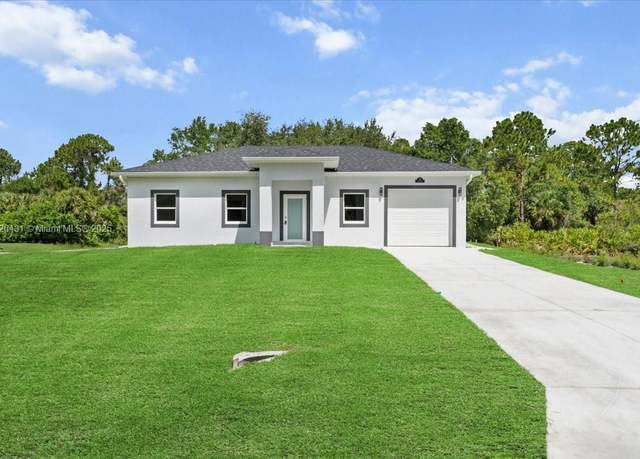 Property at 134 Fox Ave S, Lehigh Acres, FL 33974, 3 beds, 3 baths