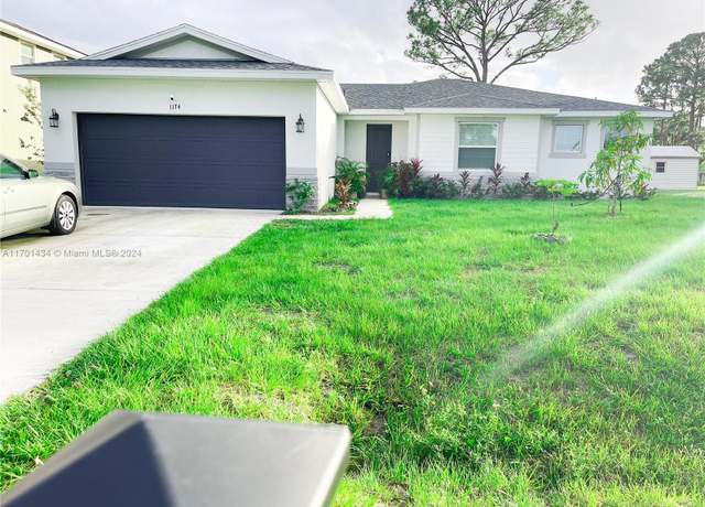 Property at 1174 Hutchins St NE, Palm Bay, FL 32909, 4 beds, 2 baths