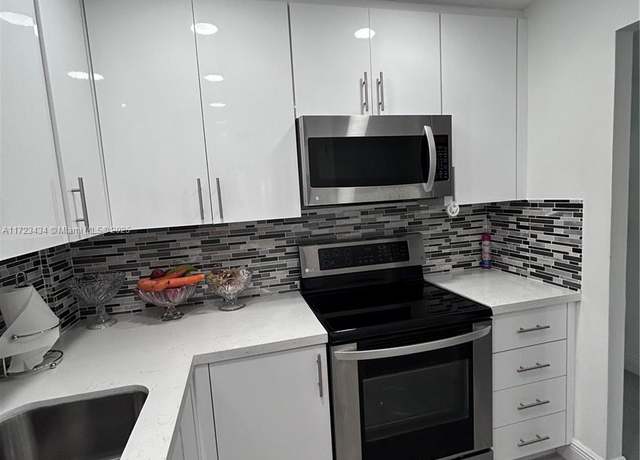 Property at 5050 NW 7th St, Miami, FL 33126, 2 beds, 2 baths