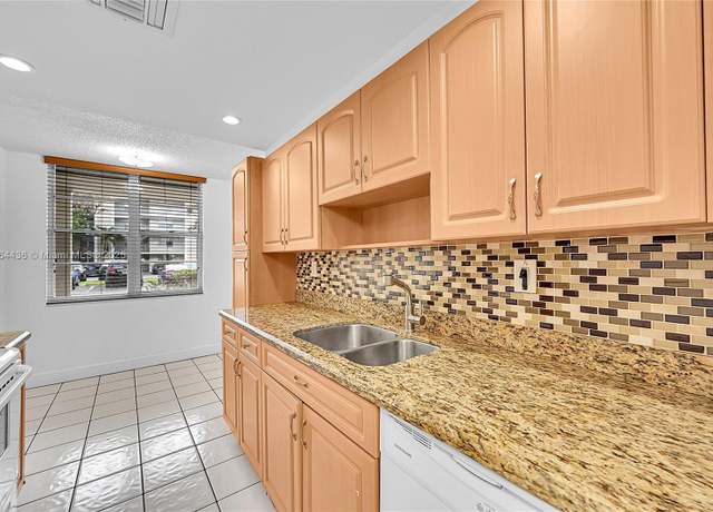 Property at 4850 NW 29th Ct #125, Lauderdale Lakes, FL 33313, 2 beds, 2 baths