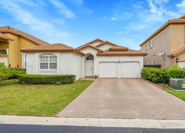 Property at 9785 NW 29th Ter, Doral, FL 33172, 3 beds, 2 baths