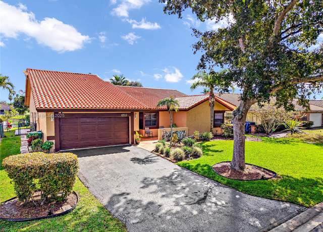 Property at 653 NW 110th Ave, Coral Springs, FL 33071, 4 beds, 3.5 baths