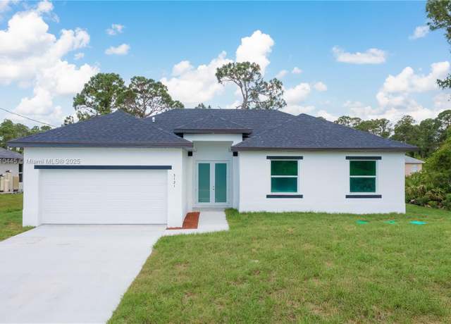 Property at 3121 71st St W, Lehigh Acres, FL 33971, 3 beds, 2 baths