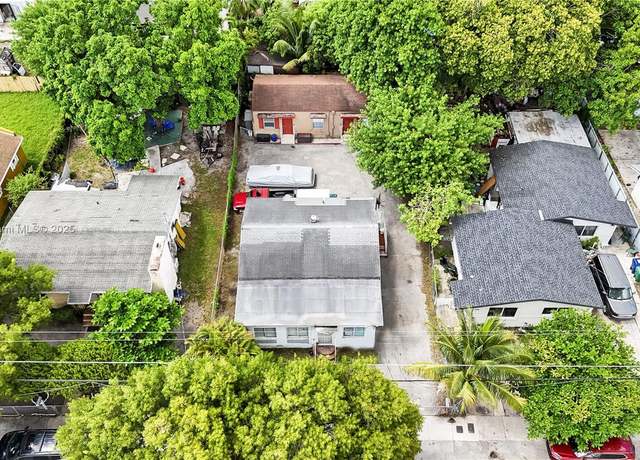 Property at 1554 NW 58th St, Miami, FL 33142, 7 beds, 3 baths