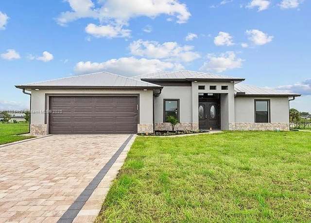 Property at 7897 16th Ter, La Belle, FL 33935, 5 beds, 3 baths