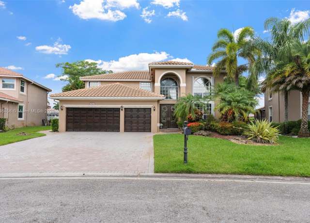 Property at 5920 NW 54th Cir, Coral Springs, FL 33067, 4 beds, 3.5 baths
