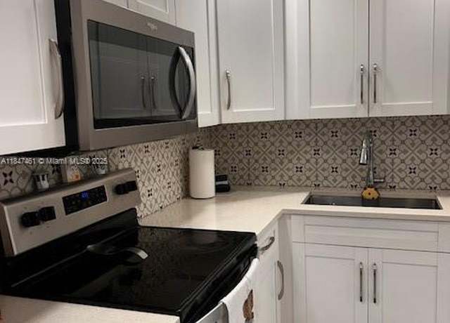 Property at 4010 Coral Springs Dr, Coral Springs, FL 33065, 2 beds, 2 baths