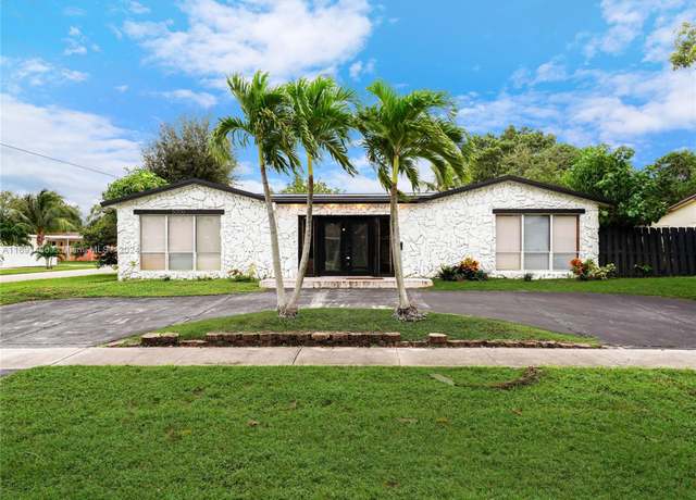 Property at 5000 Grant St, Hollywood, FL 33021, 5 beds, 3 baths