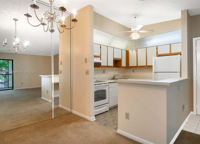 Property at 10869 W Clairmont Cir #209, Tamarac, FL 33321, 2 beds, 2 baths