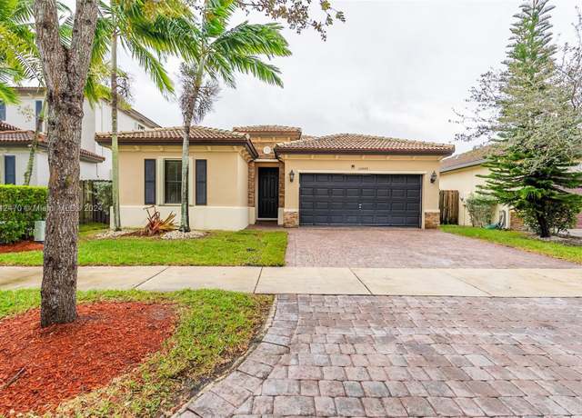 Property at 10446 SW 227th Ter, Miami, FL 33190, 4 beds, 3 baths