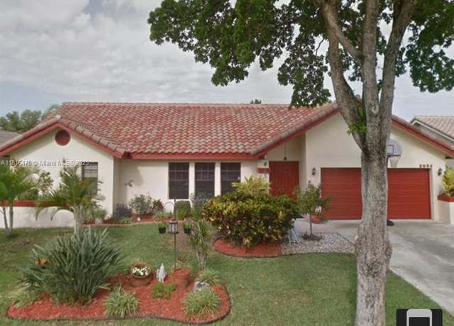 Property at 5024 NW 58th Ter, Coral Springs, FL 33067, 4 beds, 2 baths