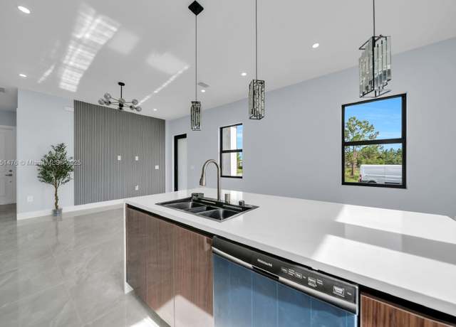 Property at 951 Candlelight Dr, Lehigh Acres, FL 33974, 3 beds, 2 baths