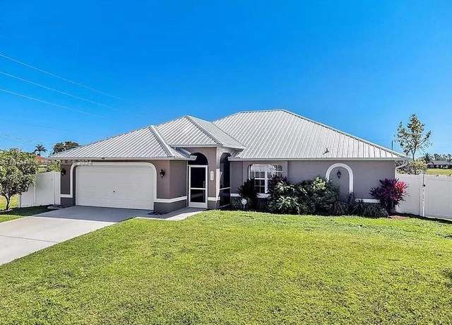 Property at 2707 NE 5th Pl, Cape Coral, FL 33909, 4 beds, 2 baths