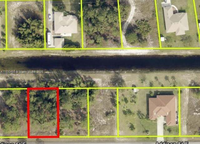 Property at 511 Addison St E, Lehigh Acres, FL 33974