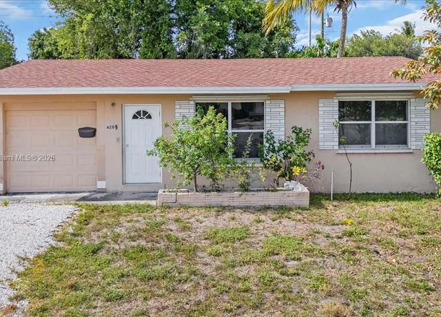 Property at 6209 Dawson St, Hollywood, FL 33023, 3 beds, 2 baths