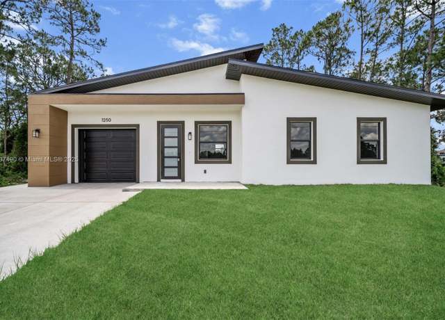 Property at 1250 Echard St E, Lehigh Acres, FL 33974, 3 beds, 3 baths