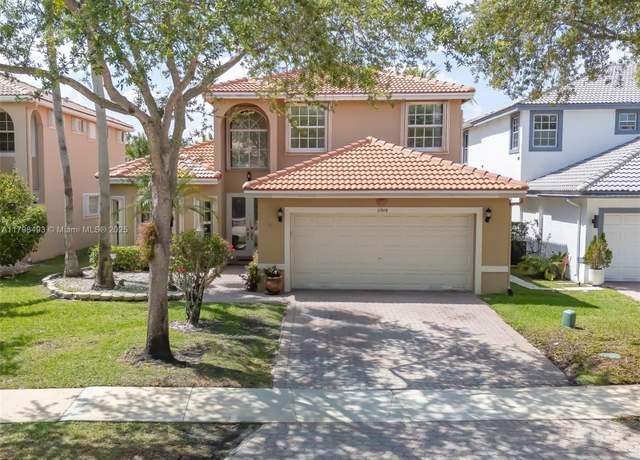 Property at 11919 NW 47th St, Coral Springs, FL 33076, 4 beds, 2.5 baths