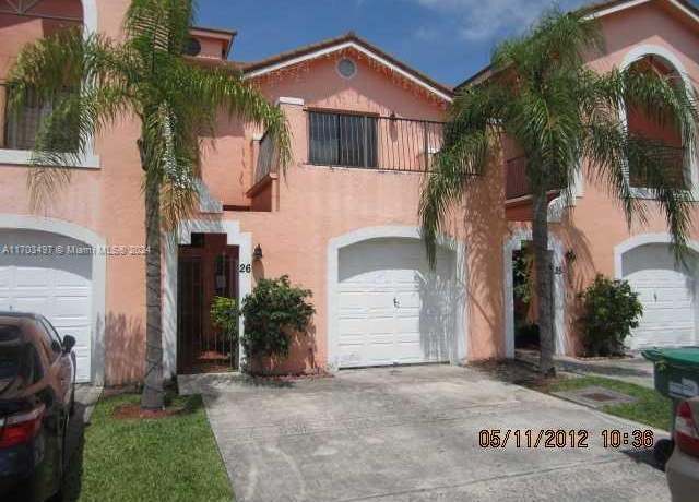 Property at 20820 San Simeon Way Unit 26-G, Miami, FL 33179, 3 beds, 2.5 baths