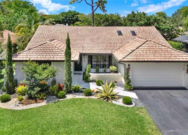 Property at 8525 NW 49th Dr, Coral Springs, FL 33067, 4 beds, 2 baths