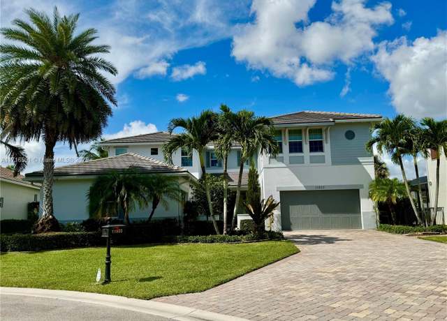 Property at 11933 NW 79th Ct, Parkland, FL 33076, 5 beds, 4.5 baths
