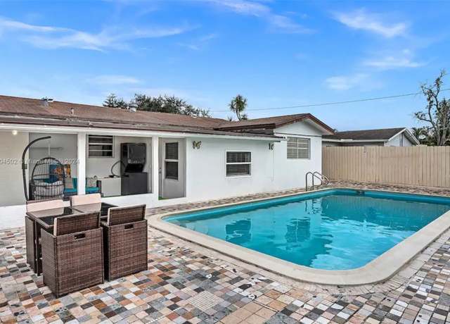 Property at 2340 N 66th Ter, Hollywood, FL 33024, 5 beds, 3 baths