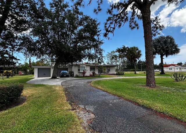 Property at 1128 Park Ln, Haverhill, FL 33417, 4 beds, 3 baths