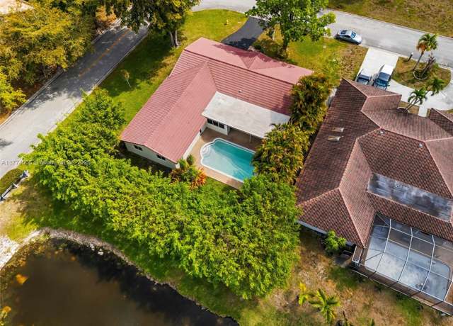 Property at 1980 NW 81st Ave, Coral Springs, FL 33071, 5 beds, 3 baths
