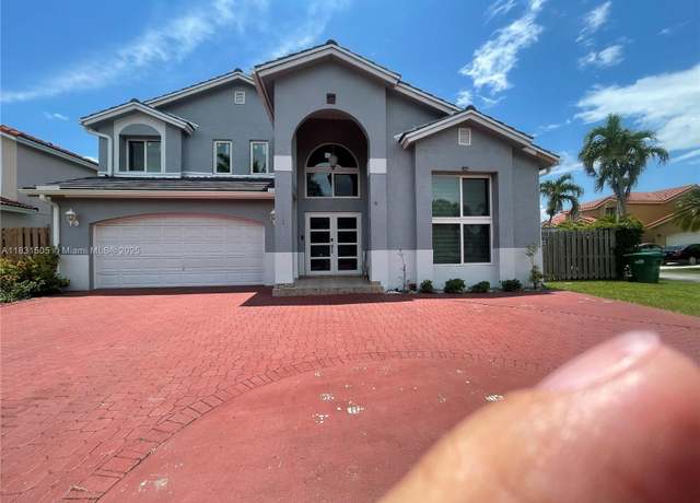 Property at 11123 SW 156th Ct, Miami, FL 33196, 6 beds, 5 baths