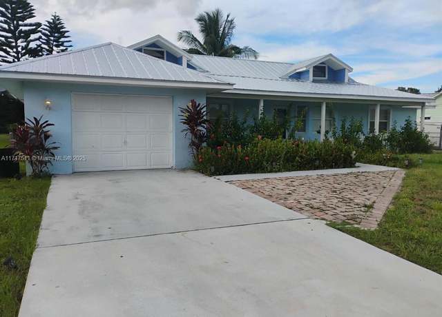 Property at 445 SW Cherryhill Rd, Port St. Lucie, FL 34953, 3 beds, 2 baths