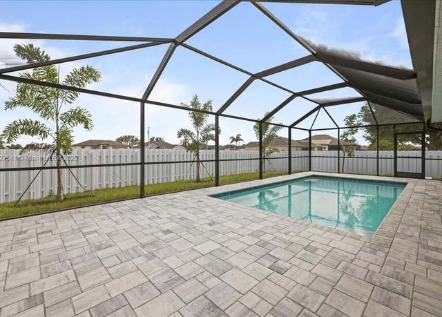 Property at 1008 NW 10th St, Cape Coral, FL 33993, 4 beds, 3 baths