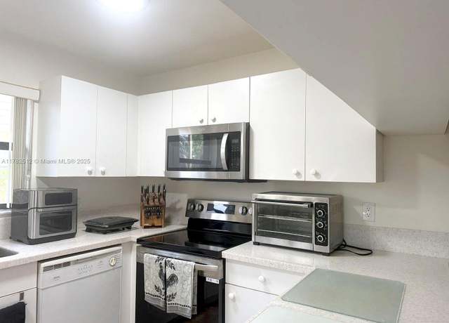 Property at 14240 SW 94th Cir Ln Unit 103-32, Miami, FL 33186, 2 beds, 2.5 baths