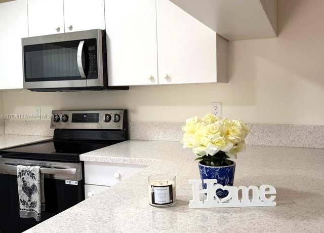 Property at 14240 SW 94th Cir Ln Unit 103-32, Miami, FL 33186, 2 beds, 2.5 baths