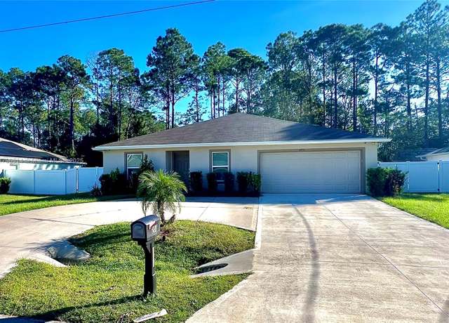 Property at 203 Palmwood Dr, Palm Coast, FL 32164, 4 beds, 2 baths