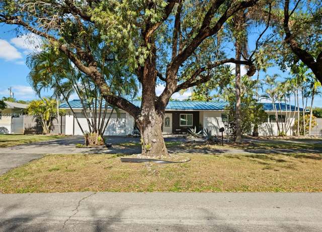 Property at 1031 Redbird Ave, Miami Springs, FL 33166, 5 beds, 3 baths