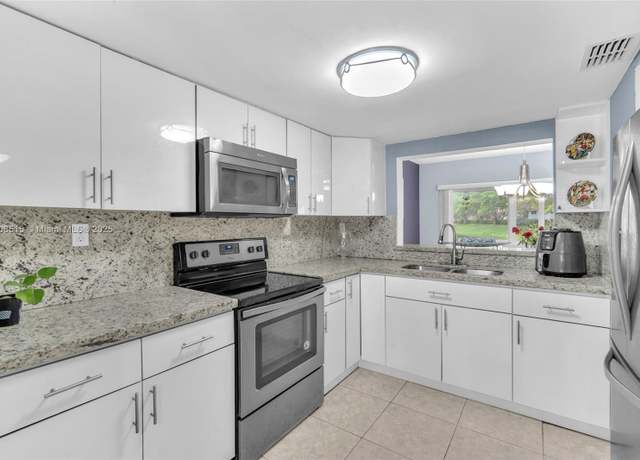 Property at 821 NW 91st Ter #821, Plantation, FL 33324, 3 beds, 2.5 baths
