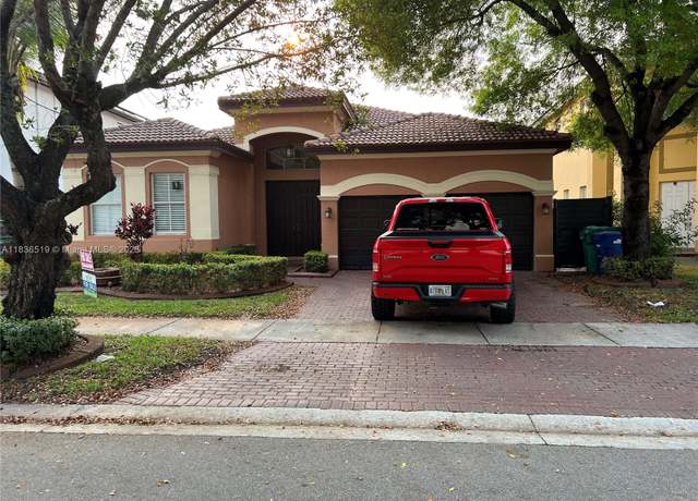 Property at 18122 NW 91st Ct, Hialeah, FL 33018, 4 beds, 3 baths