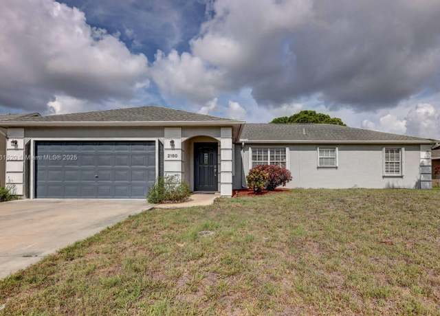 Property at 2150 SE Dolphin Rd, Port St. Lucie, FL 34952, 3 beds, 2 baths