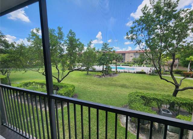 Property at 12651 SW 16th Ct Unit 211B, Pembroke Pines, FL 33027, 1 bed, 1.5 baths