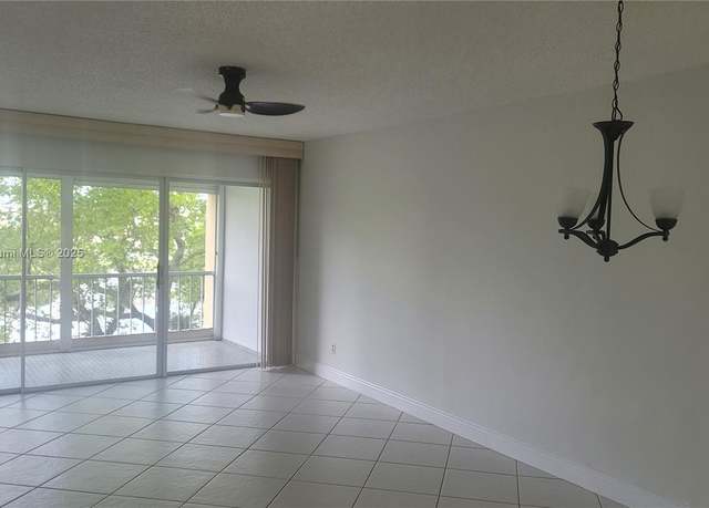 Property at 6091 NW 61 Ave #310, Tamarac, FL 33319, 2 beds, 2 baths