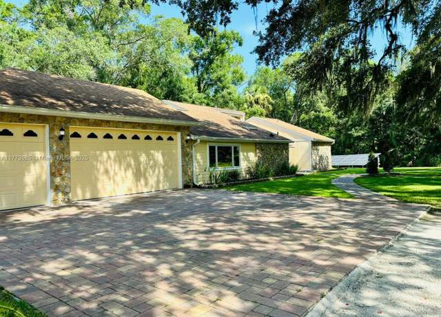 Property at 1950 S Tanner Rd, Orlando, FL 32820, 4 beds, 2 baths