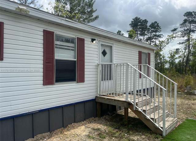 Property at 7551 NE 97th Ct, Other City - In The State Of Florida, FL 32621, 3 beds, 2 baths