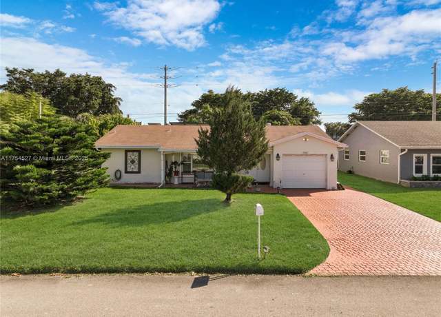 Property at 9400 NW 70th St, Tamarac, FL 33321, 2 beds, 2 baths