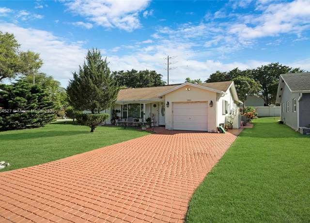 Property at 9400 NW 70th St, Tamarac, FL 33321, 2 beds, 2 baths